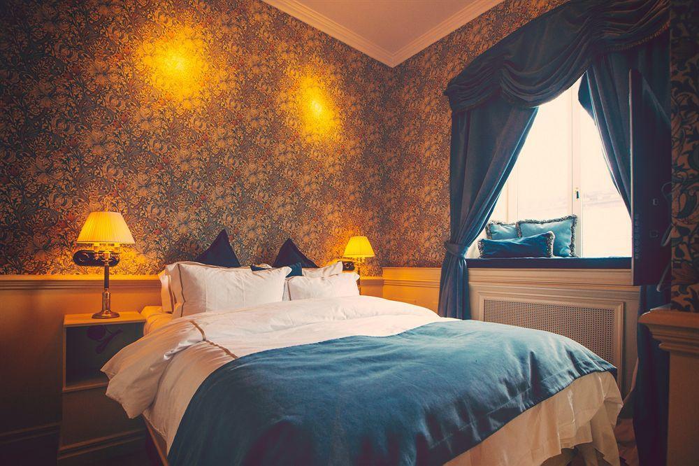 גטבורג Hotel Pigalle מראה חיצוני תמונה A bedroom at the hotel